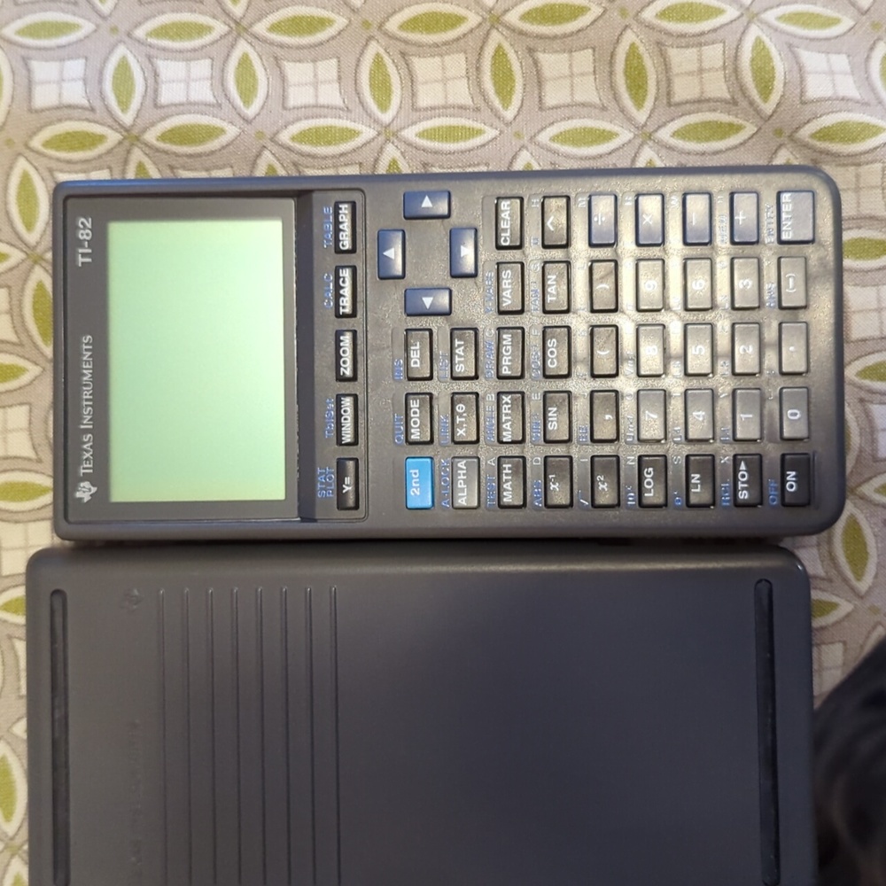 Texas Instruments scientific calculator TI-82 with batteries. New without tags.
